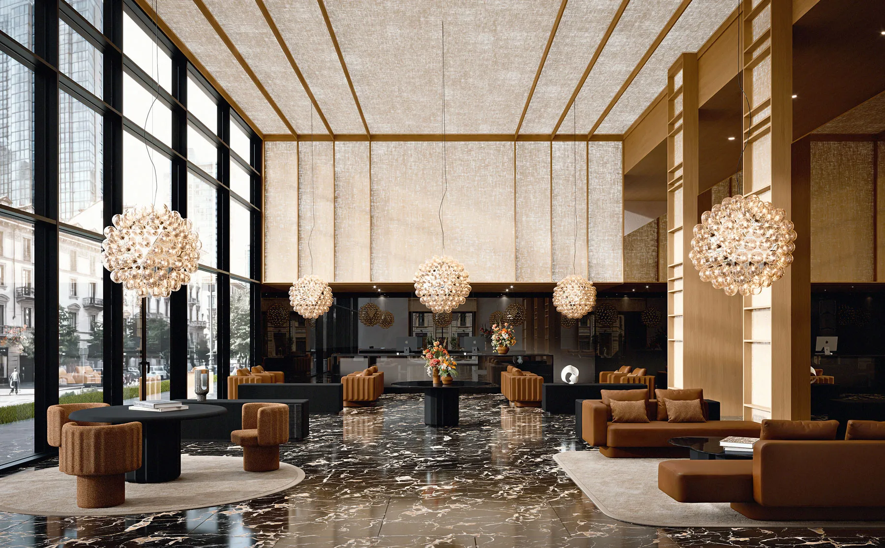 Sabree luxury sofa in cognac leather in a luxury hotel lobby with gold travertine ceiling, black marble floor and statement chandeliers — Italian design