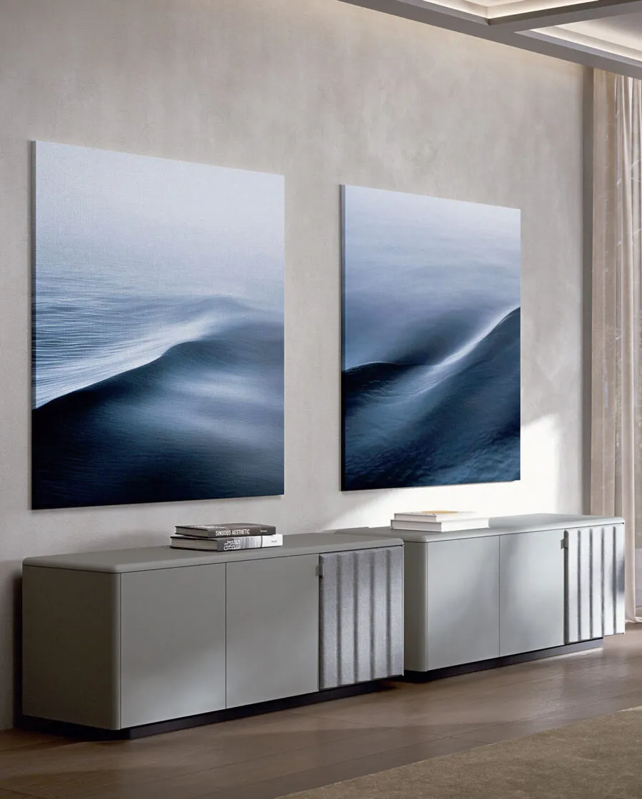 Sabree design sideboard in lacquered grey finish, four-module configuration, in a minimal living room with large ocean artwork — Italian design