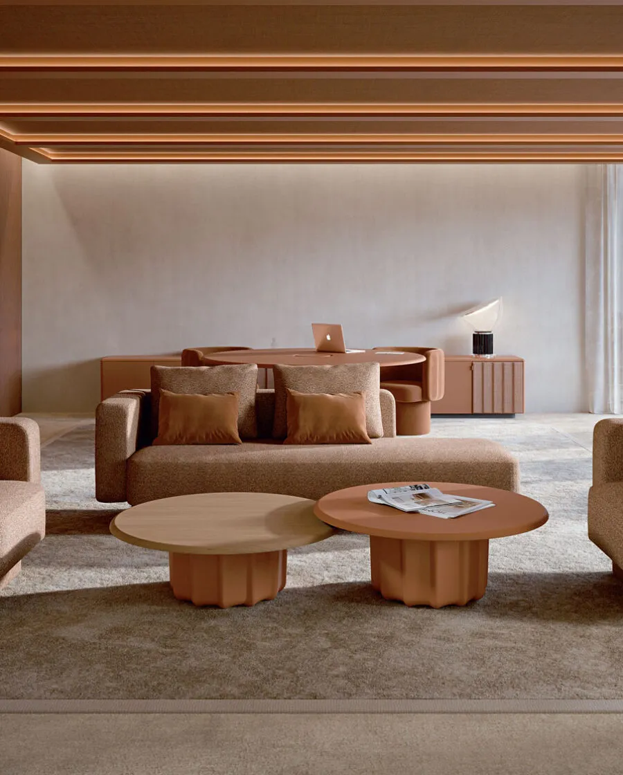 Sabree round luxury coffee table in oak finish in a warm-toned penthouse living room with camel sofa and panoramic city windows — Italian design