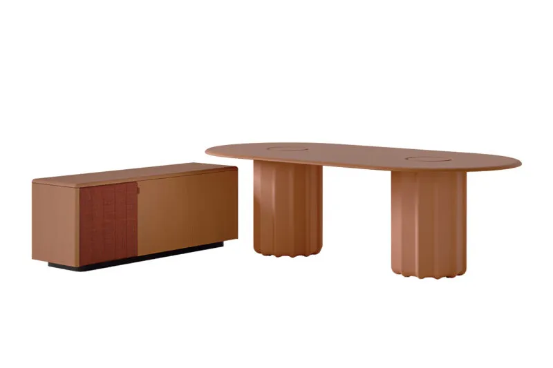 Sabree oval table design with terracotta sculptural base paired with Sabree sideboard in terracotta finish, collection view on white background — Frezza