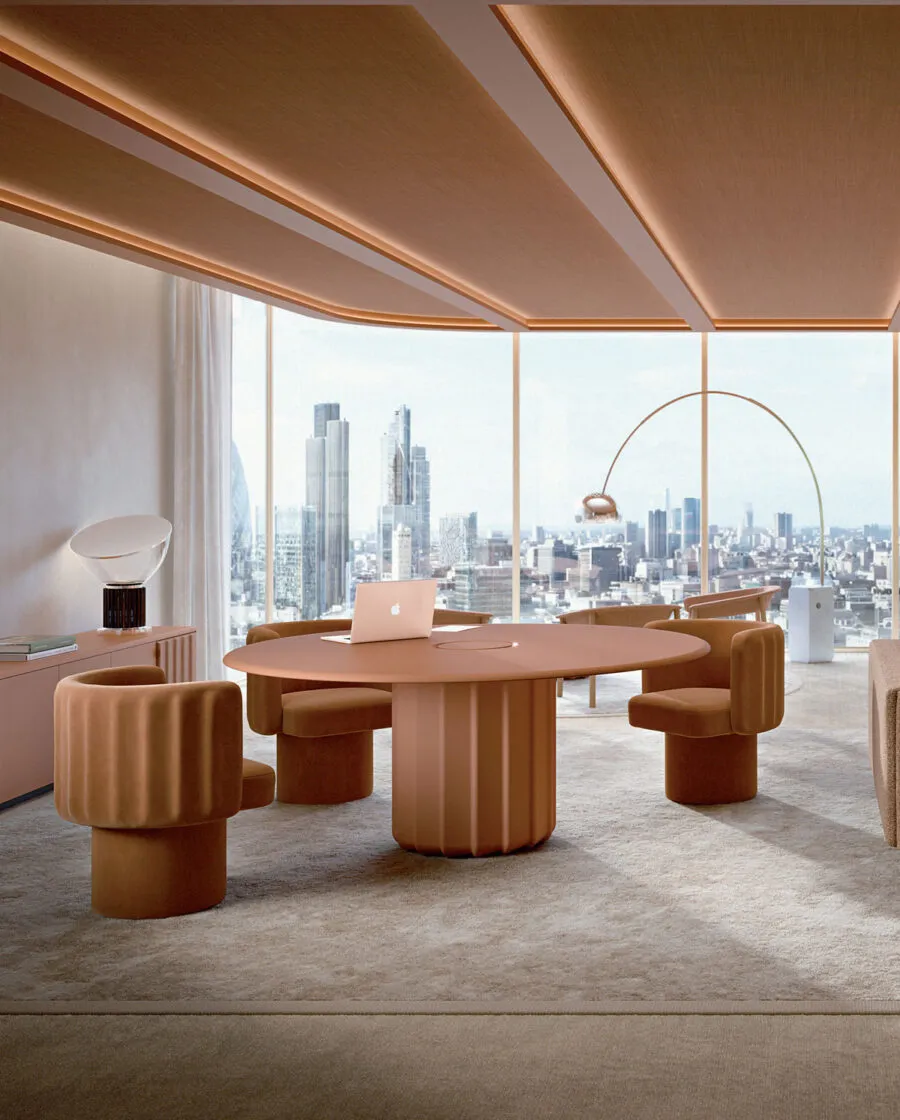 Sabree round table design with black base in luxury hotel lobby with marble floor and crystal sphere chandeliers — Frezza contract